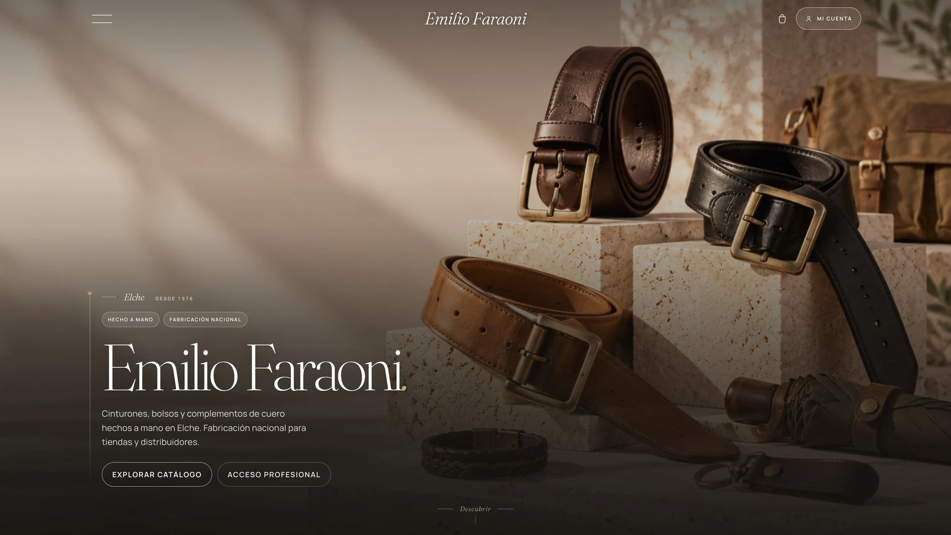 Emilio Faraoni homepage presenting the brand over an arrangement of leather belts on stone blocks, with catalogue and professional-access actions